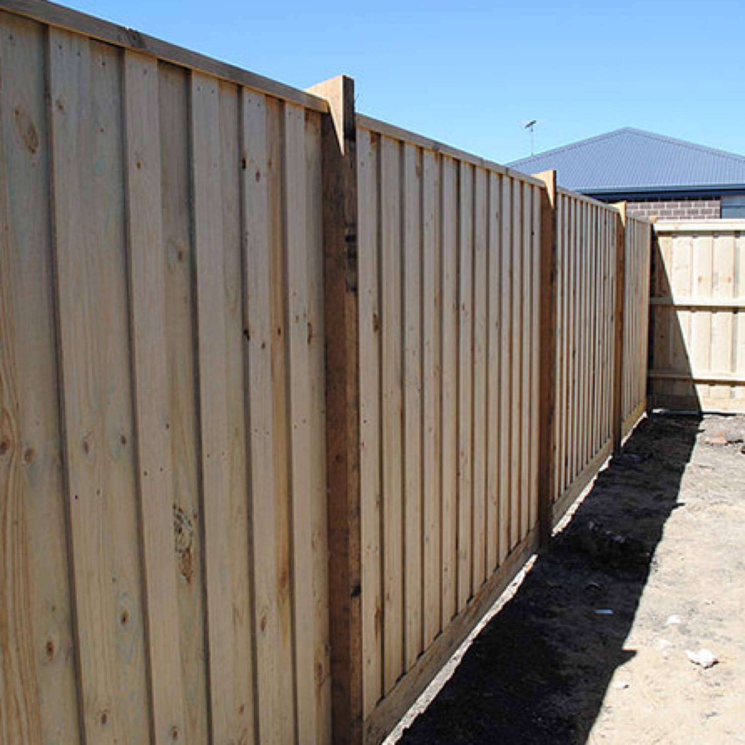 Fence framing showing posts and rails built to standard