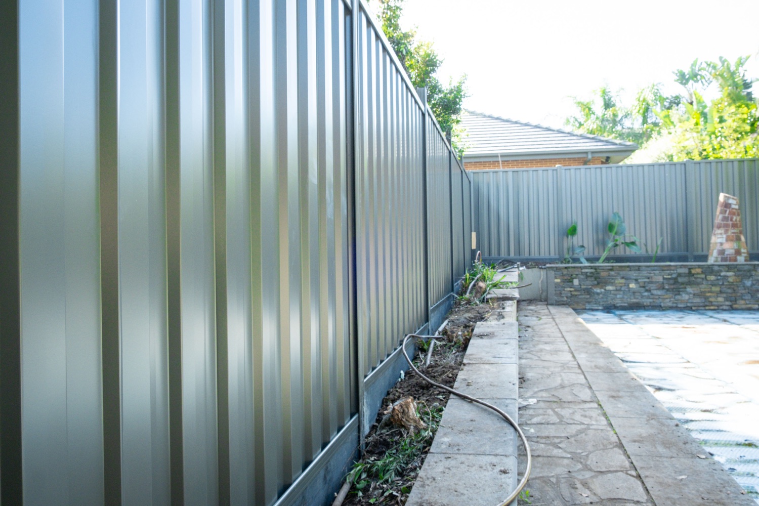 Grey Colorbond fence side view